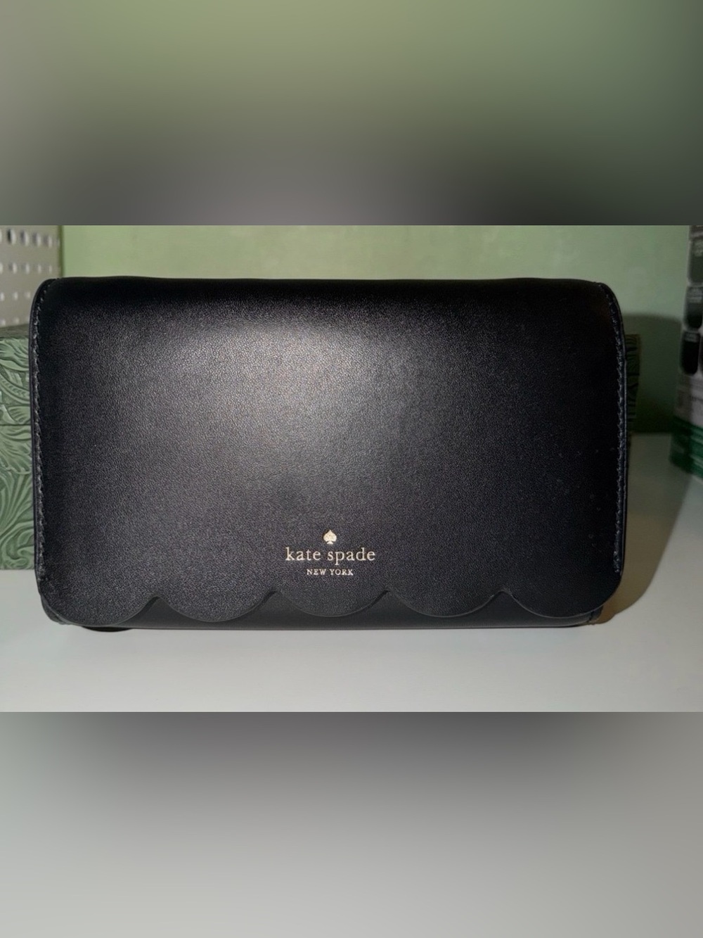 kate spade black scalloped-edge clutch with gold logo